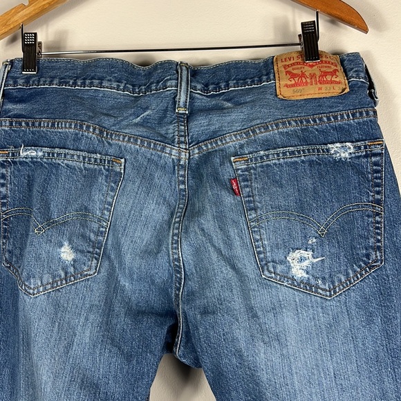 Levi’s 569 Medium Wash Distressed Boot Cut Jeans - Picture 4 of 5